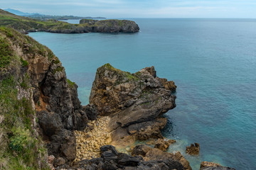 Image of scenic beach es of Torimbia and Toranda, Asturias, Spain.