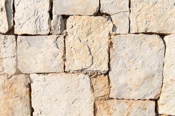 stone wall made of various stones, structure