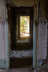 Corridor of an old, abandoned building after a fire