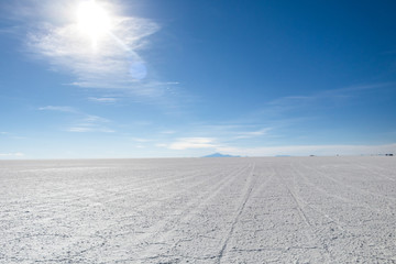 Landscape of incredibly white salt flat Salar de Uyuni, amid the Andes in southwest Bolivia, South America