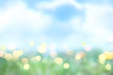 Obraz premium Summer spring nature blurred background.Green grass blue sky texture.Easter backdrop.