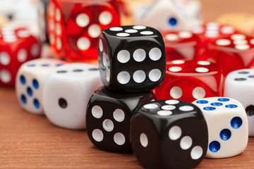Dice on a wooden table. Concept for business risk.
