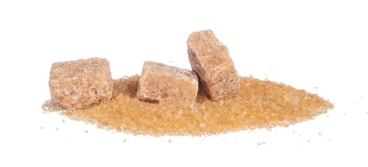 sugar cubes and sugar-sand on a white background