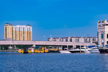 Tampa Bay, Florida . April 28, 2019. S Harbour Island Blvd bridge, luxury and taxi boats.