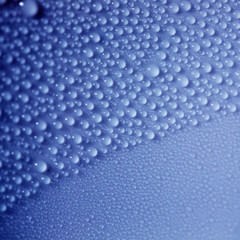 Water Drops. Bubbles close-up. The texture of gel cream. Oxygen bubbles in clear blue water, close-up. Mineral water. Water enriched with oxygen.