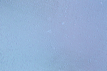 Water Drops. Bubbles close-up. The texture of gel cream. Oxygen bubbles in clear blue water, close-up. Mineral water. Water enriched with oxygen.