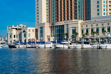 Tampa Bay, Florida. April 28, 2019 . Luxury boats and Marriott Water Street Hotel on Hillsborough...
