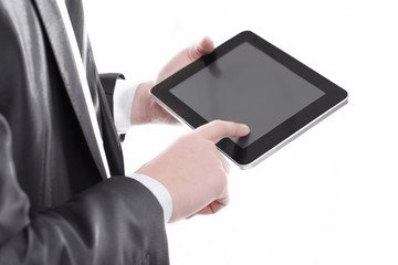 close up.businessman tapping the screen of the digital tablet