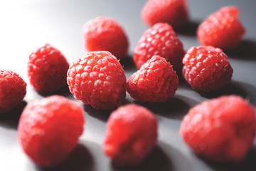 Fresh raspberry, close-up of raspberry with light