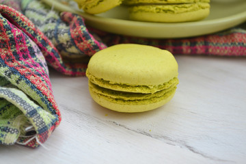 Delicious french dessert. Pistachios pastel cake macaron or macaroon.