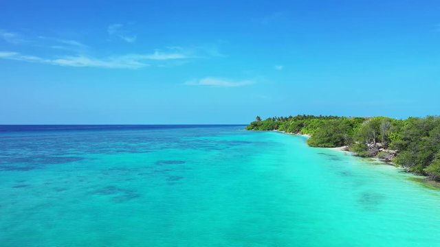 virgin nature of Thailand, crystal clear water of Gulf Of Siam,deserted uninhabited island with  Arecaceae forest and white sand beaches aerial dolly in shot