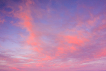 Naklejka na ściany i meble Beautiful sunset clouds in pink colors