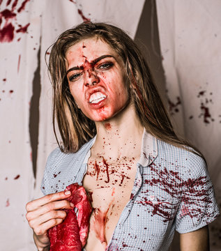 Animal Instinct. Aggressive Girl In Blood. Human Internal Organ Trade. Bloody Halloween. Anatomy. Zombie. Medical Transplantation. Cannibalism. Donation And Donar. Meatman In Butcher Shop, Butchery