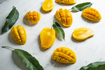 Mango in the basket on White wood background