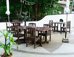 cafe with empty tables and chairs
