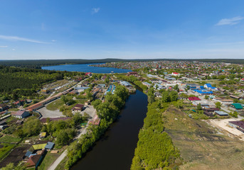 Sysert city. River and pond. Aerial. Summer day
