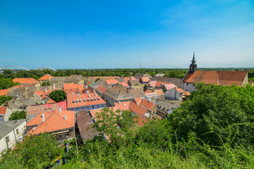 Fototapeta premium Novi Sad, Serbia June 13, 2019: Roofs of the Petrovaradin suburb of Novi Sad
