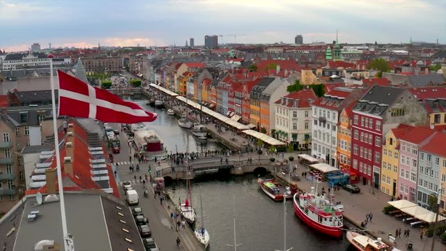 Danish Flags over Nyhavn district in Copenhagen, Denmark.