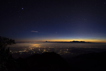 A beautiful night city view from campsite 7 mount Raung. Raung is the most challenging of all Java’s mountain trails, also is one of the most active volcanoes on the island of Java in Indonesia.