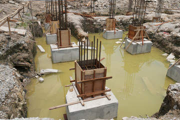 Pile cap and column stump under construction at the construction site. Constructed using reinforced...