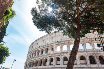 Obraz premium ROME, Italy: Great Roman Colosseum (Coliseum, Colosseo) also known as the Flavian Amphitheatre. Famous world landmark. Scenic urban landscape