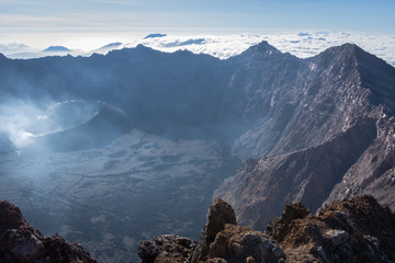 A view from 'Puncak Sejati' (3,344m) and its Caldera. Raung is the most challenging of all Java’s mountain trails, also is one of the most active volcanoes on the island of Java in Indonesia.