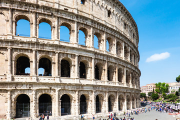 Fototapeta na wymiar ROME, Italy: Great Roman Colosseum (Coliseum, Colosseo) also known as the Flavian Amphitheatre. Famous world landmark. Scenic urban landscape