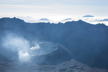 A view from 'Puncak Sejati' (3,344m) and its Caldera. Raung is the most challenging of all Java’s mountain trails, also is one of the most active volcanoes on the island of Java in Indonesia.