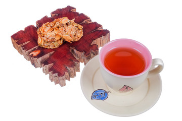 Tea cup and florentine cookies  on white background