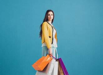 Fashionable woman with shopping bags