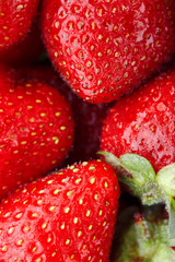 Juicy, ripe natural red strawberries without GMO. Strawberry - full frame. Close-up