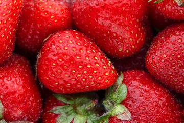 Juicy, ripe natural red strawberries without GMO. Strawberry - full frame. Close-up