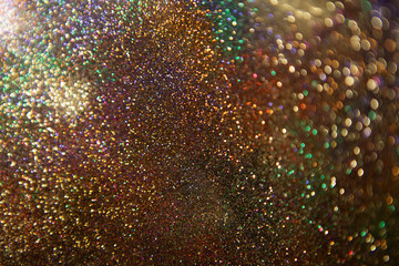 Glitter wonderful lights background. Glitter vintage lights background.Abstract dark.
