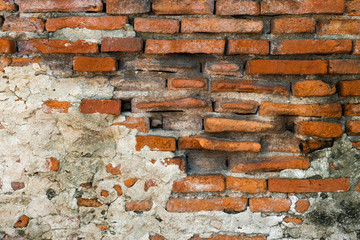 Old red brick wall bracket for background.