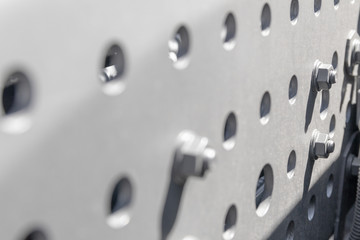 Metal structure twisted with bolts and screws