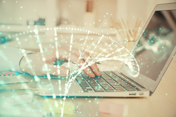 DNA hologram with businessman working on computer on background. Concept of bioengineering. Double...