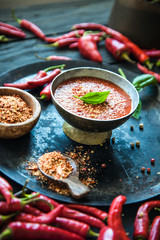 Fresh Red Chili Pepper. Spices on wood