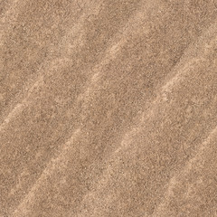 The texture of sea sand with a textured surface