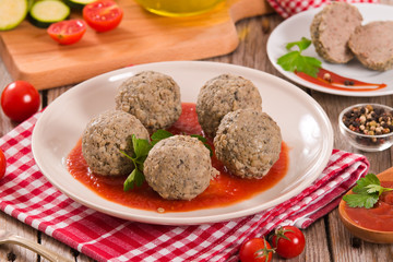 Meatballs with tomato sauce.