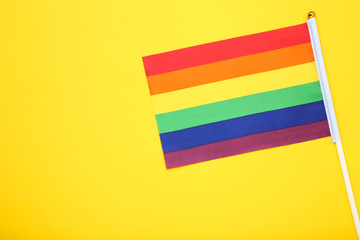 Rainbow flag on yellow background