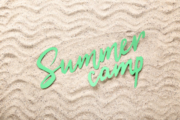 Paper text Summer camp on beach sand