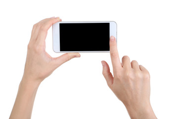 Female hands holding smartphone on white background