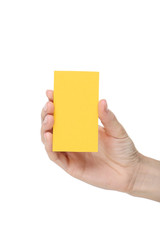 Female hand holding blank card on white background