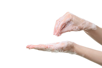 Woman washing hands with soap