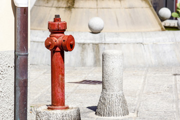 Fototapeta na wymiar Red hydrant on the city street . Detail