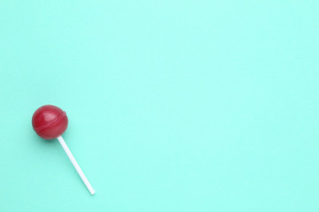 Sweet lollipop on mint background