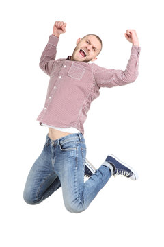Jumping young man on white background