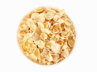 Corn flakes in bowl on white background