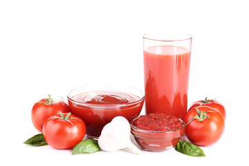 Tomato juice in glass with ketchup and garlic isolated on white background