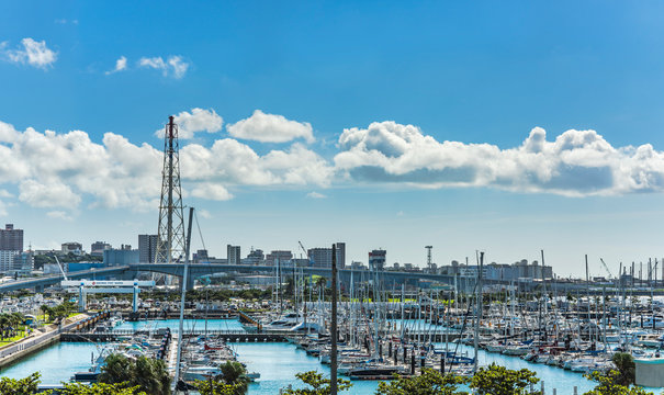 Leisure boats lined in the Ginowan harbor marina seen from Okinawa conversion center